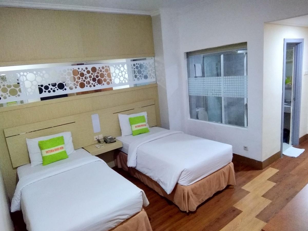 Hotel Victoria River View Banjarmasin  Extérieur photo